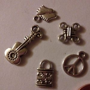 5 Silver tone charms